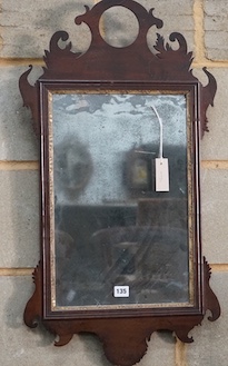 An 18th century mahogany fret cut wall mirror, width 44cm, height 80cm